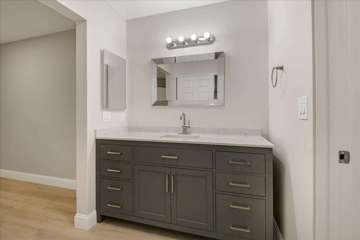 127 Rancho Drive San Jose, CA 95111 - Photo 16 of 25 a bathroom with a sink vanity and mirror