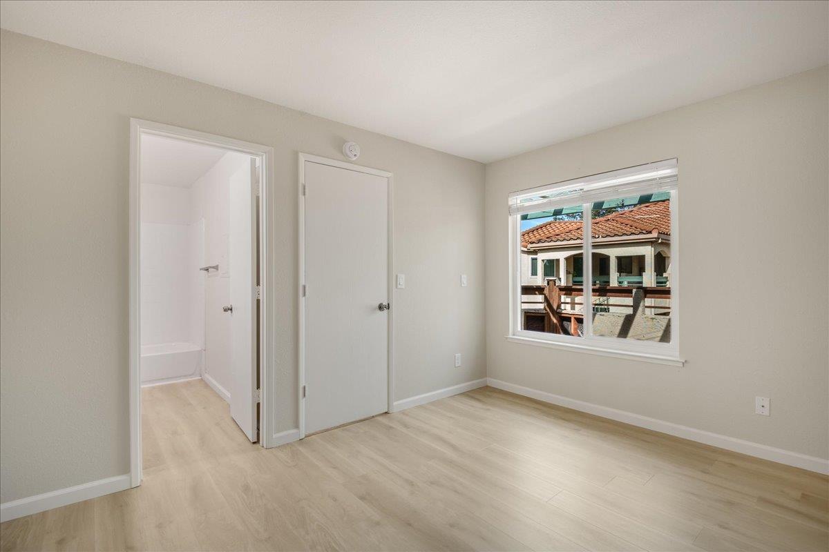 127 Rancho Drive San Jose, CA 95111 - Photo 23 of 25 an empty room with windows and closet