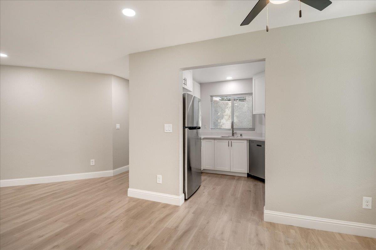 127 Rancho Drive San Jose, CA 95111 - Photo 8 of 25 a view of a kitchen with a sink and a refrigerator