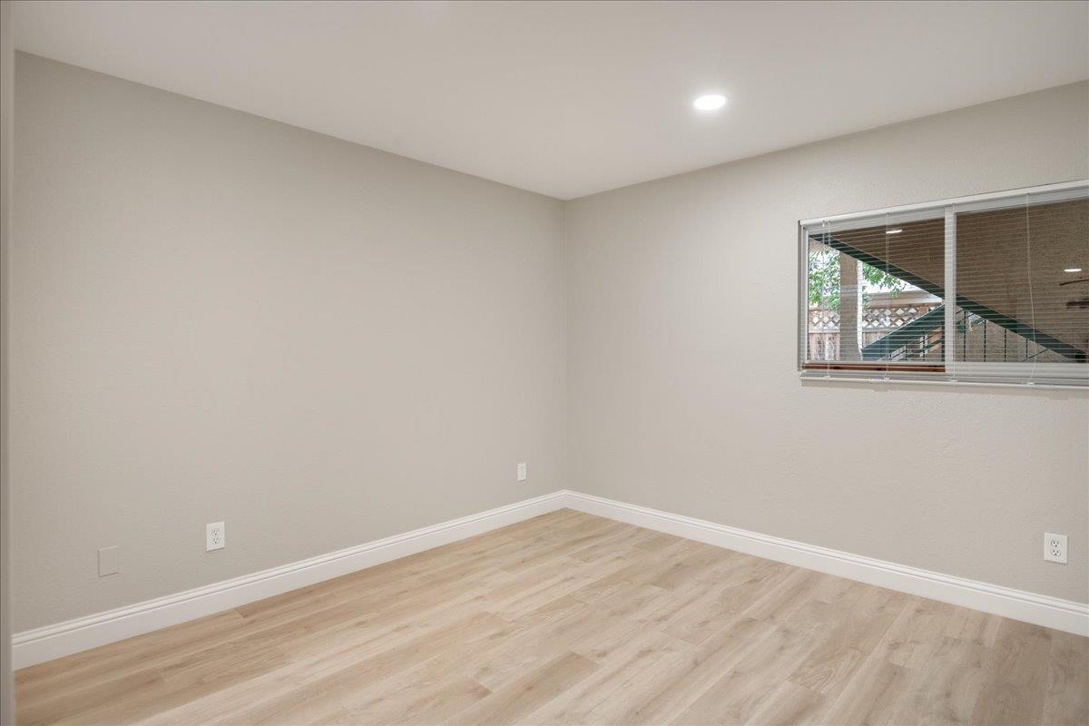 127 Rancho Drive San Jose, CA 95111 - Photo 10 of 25 wooden floor in an empty room with a window