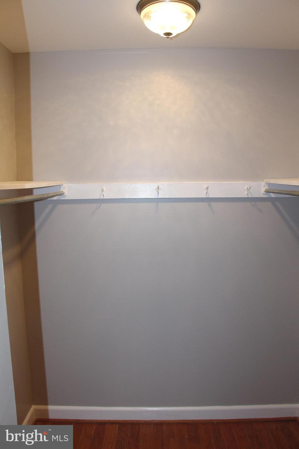11200 Chestnut Grove Square, Unit 102 Reston, VA 20190 - Photo 22 of 30 Walk-in closet in master bedroom