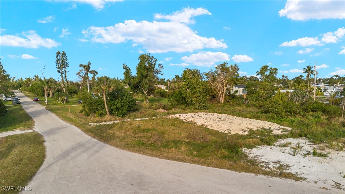 5476 Easy Street Bokeelia, FL 33922 - Photo 3 of 11 a view of a yard