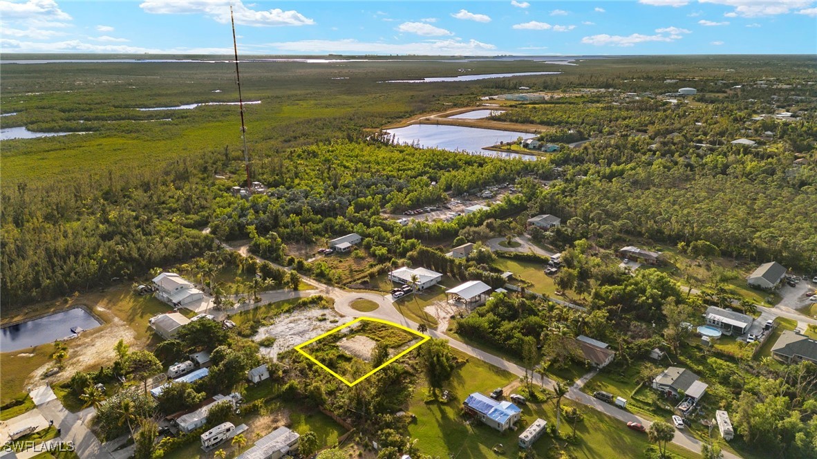 5476 Easy Street Bokeelia, FL 33922 - Photo 6 of 11 a view of an ocean and a city