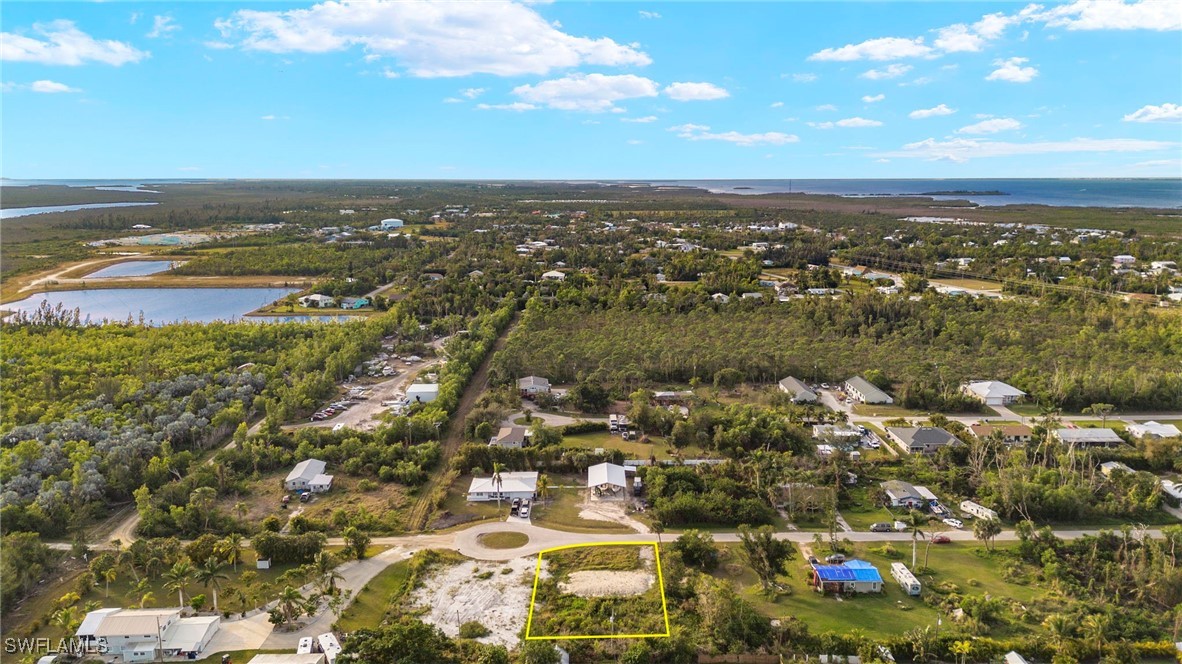 5476 Easy Street Bokeelia, FL 33922 - Photo 10 of 11 an aerial view of residential building and ocean