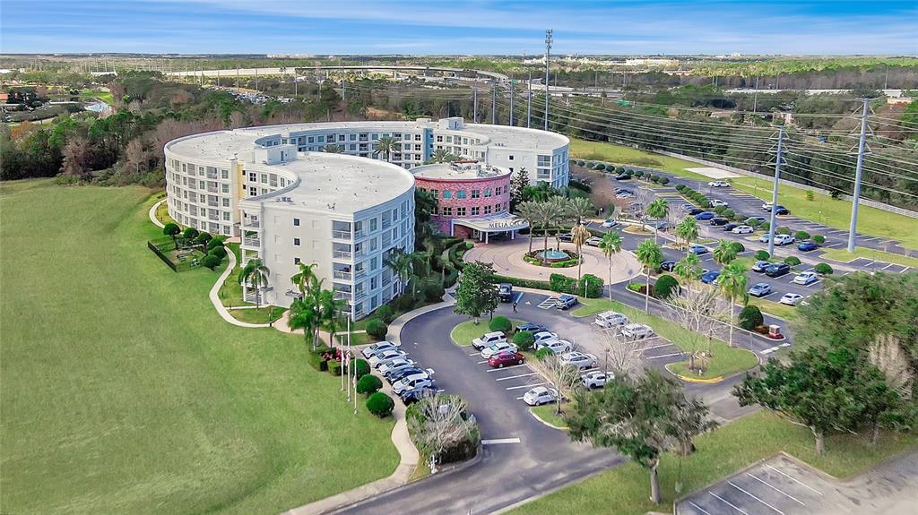 225 Celebration Place, Unit 212 Celebration, FL 34747 - Photo 3 of 35 an aerial view of a house with a garden