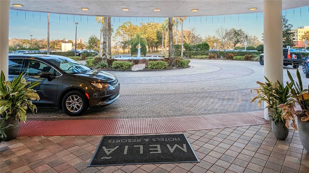 225 Celebration Place, Unit 212 Celebration, FL 34747 - Photo 8 of 35 a view of a car parked in front of a building