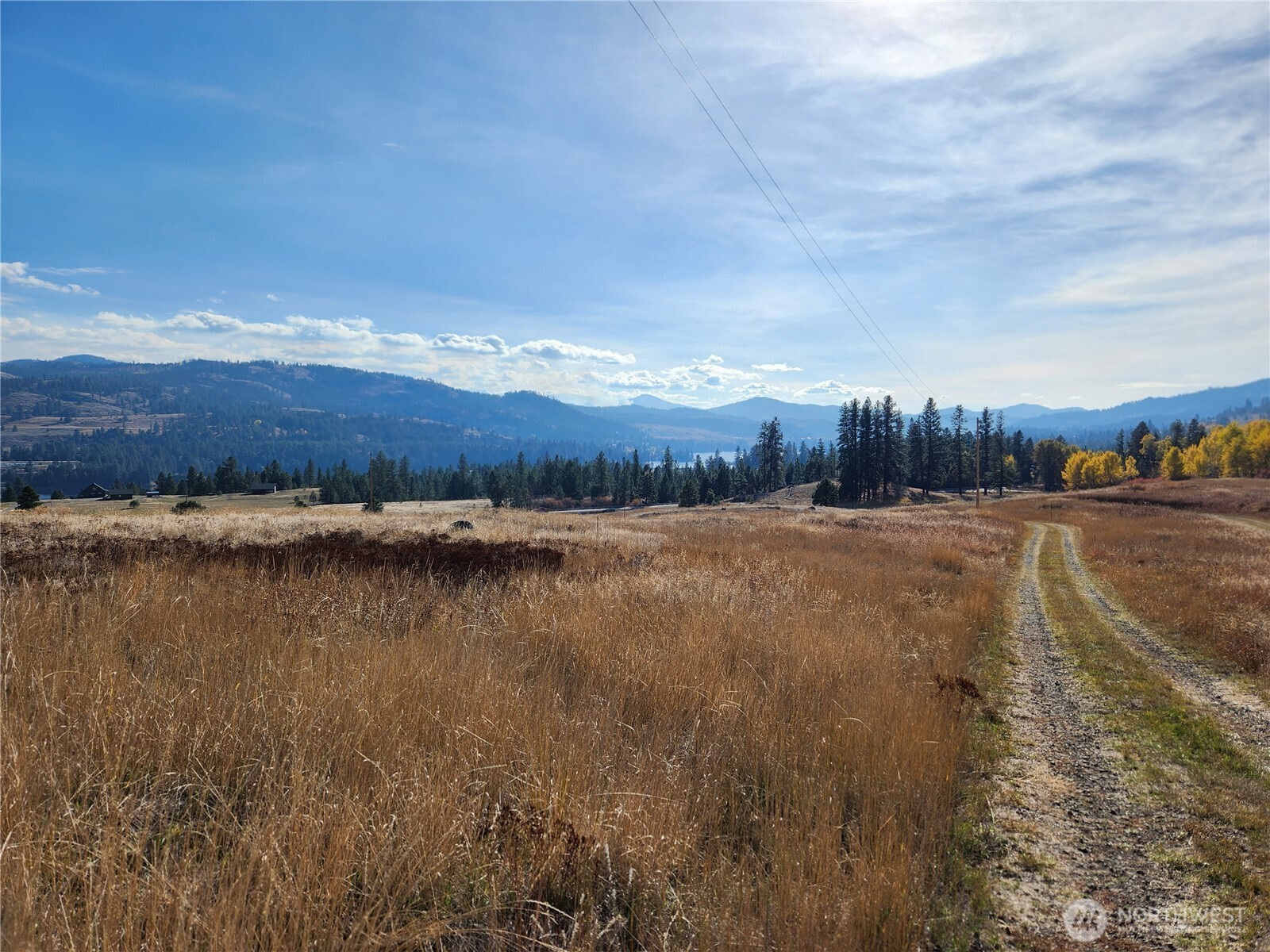 24 Spoke Lane Republic, WA 99166 - Photo 2 of 14 a view of an lake and mountain