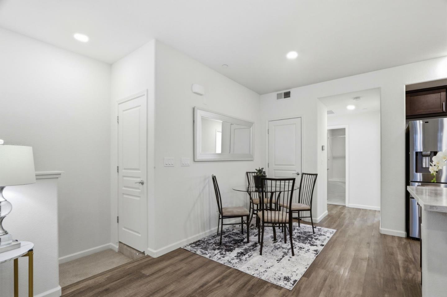 637 Clover Circle Milpitas, CA 95035 - Photo 13 of 39 a view of a dining room with furniture and wooden floor