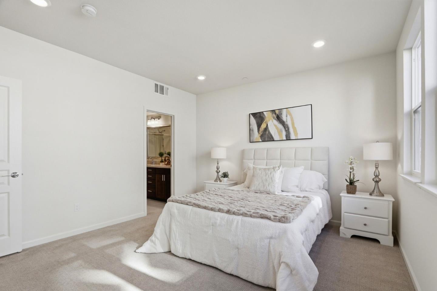 637 Clover Circle Milpitas, CA 95035 - Photo 15 of 39 a bedroom with a large bed and a couch