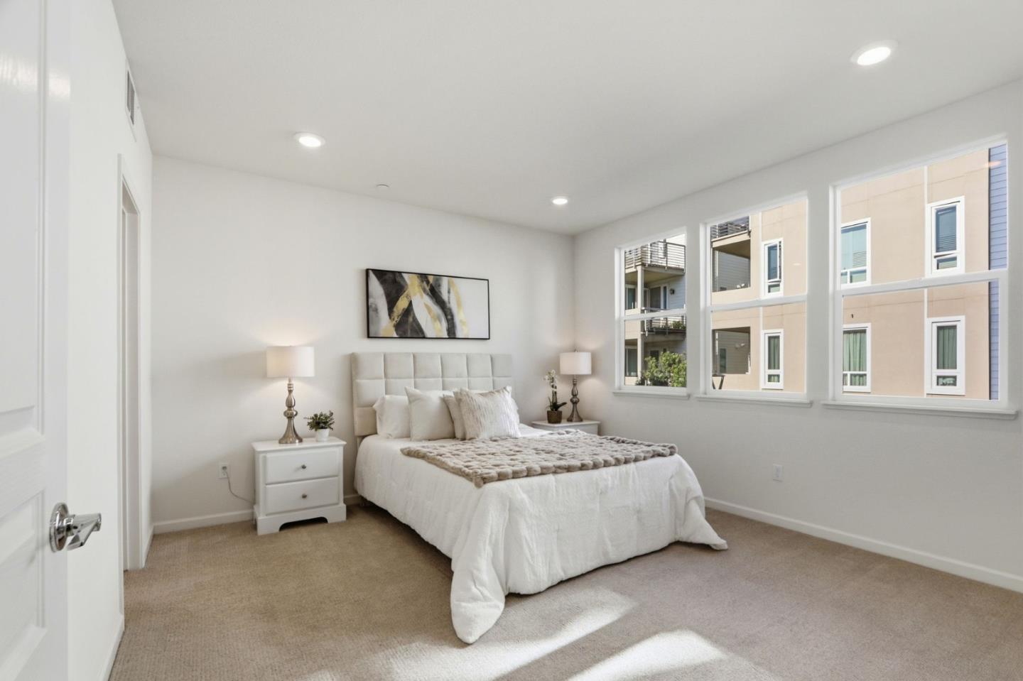 637 Clover Circle Milpitas, CA 95035 - Photo 17 of 39 a bedroom with a bed and a large mirror