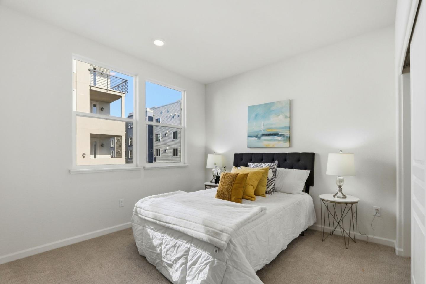 637 Clover Circle Milpitas, CA 95035 - Photo 18 of 39 a bedroom with a bed and night stand