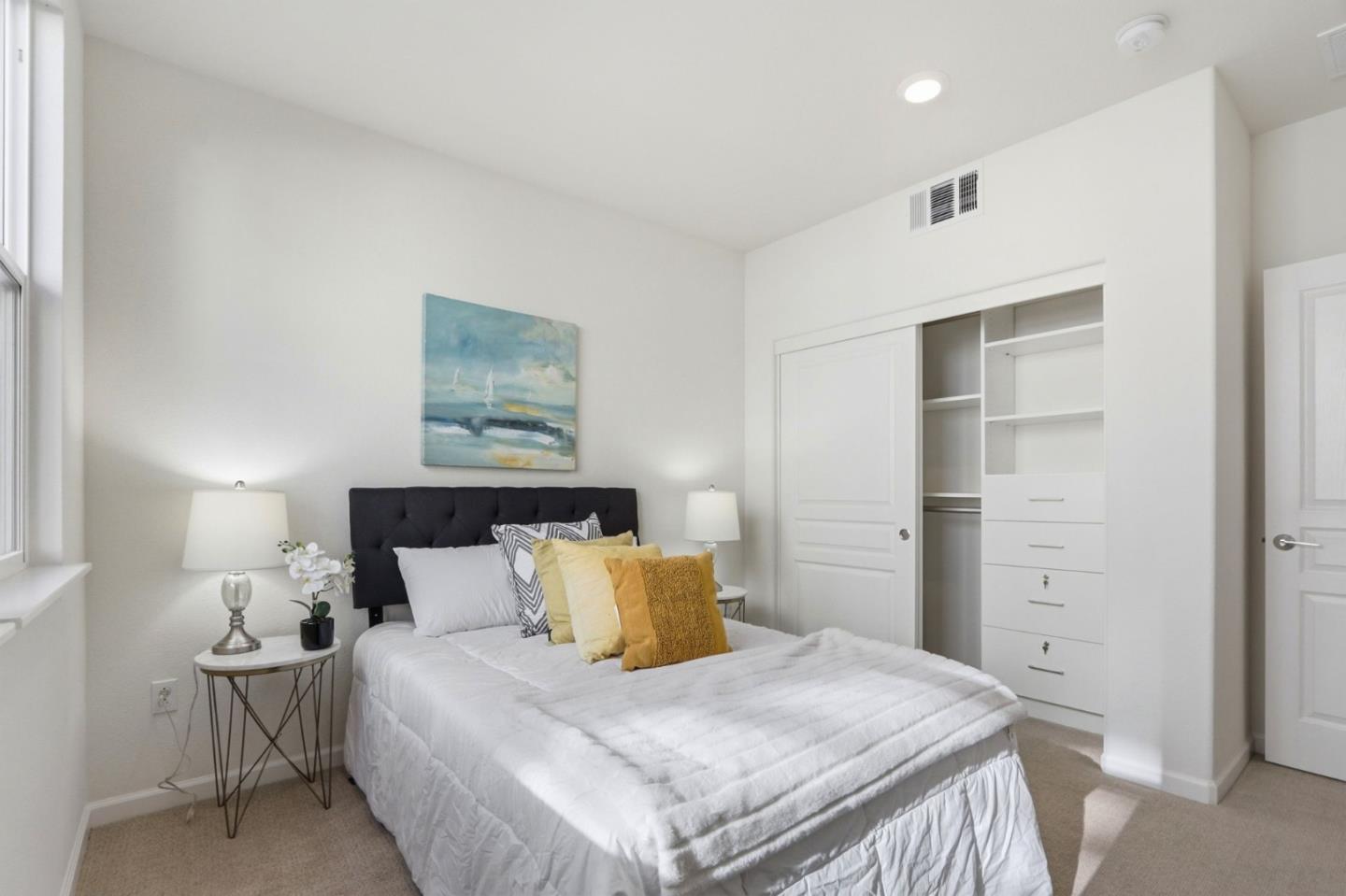 637 Clover Circle Milpitas, CA 95035 - Photo 19 of 39 a bedroom with a bed and a cabinets
