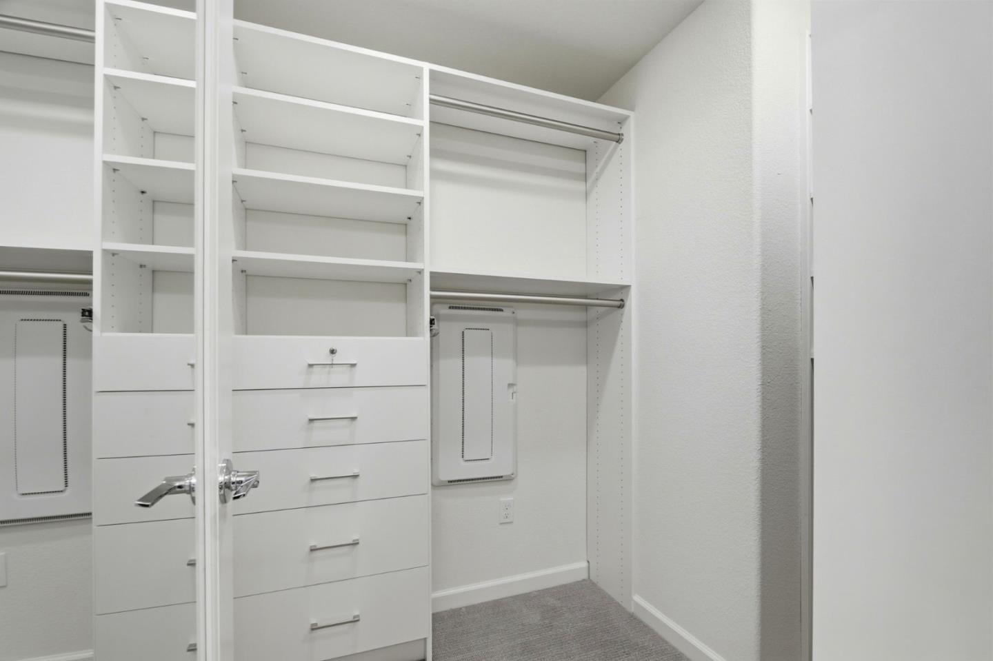 637 Clover Circle Milpitas, CA 95035 - Photo 21 of 39 a view of walk in closet with empty racks