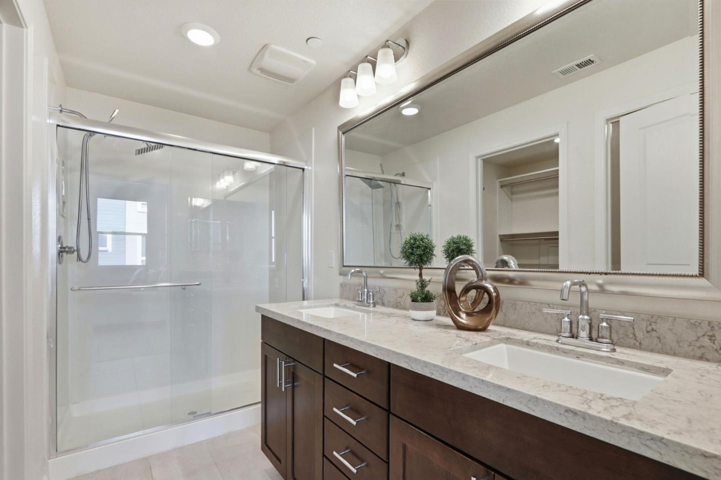 637 Clover Circle Milpitas, CA 95035 - Photo 22 of 39 a bathroom with a granite countertop sink mirror and double