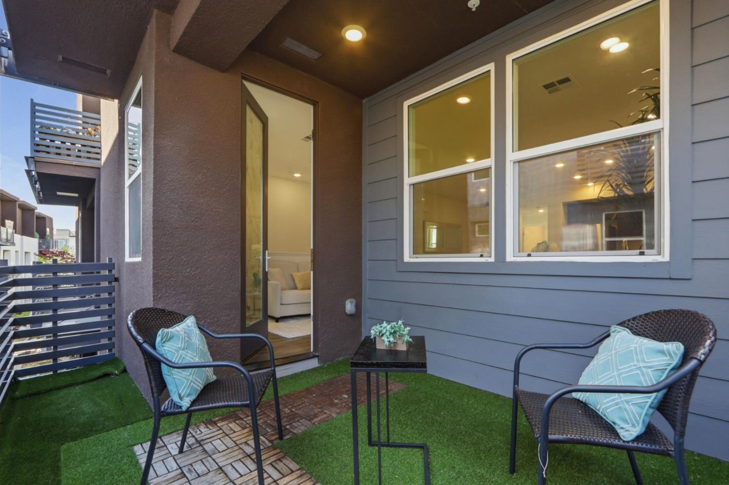 637 Clover Circle Milpitas, CA 95035 - Photo 27 of 39 a front view of a house with outdoor seating