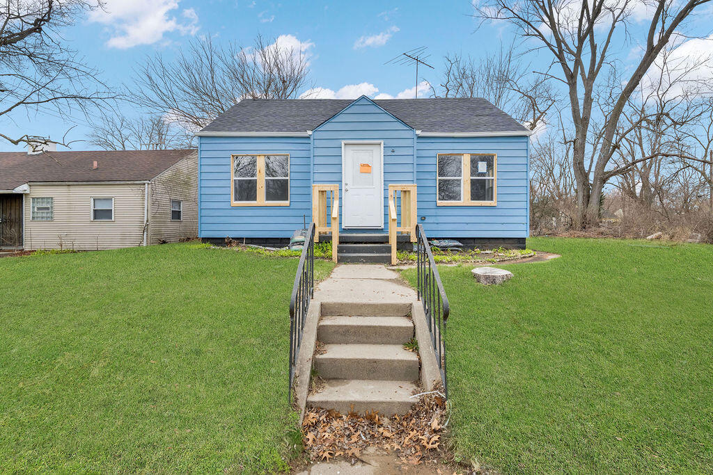 4084 Tyler Street Gary, IN 46408 - Photo 19 of 21 a front view of a house with a yard
