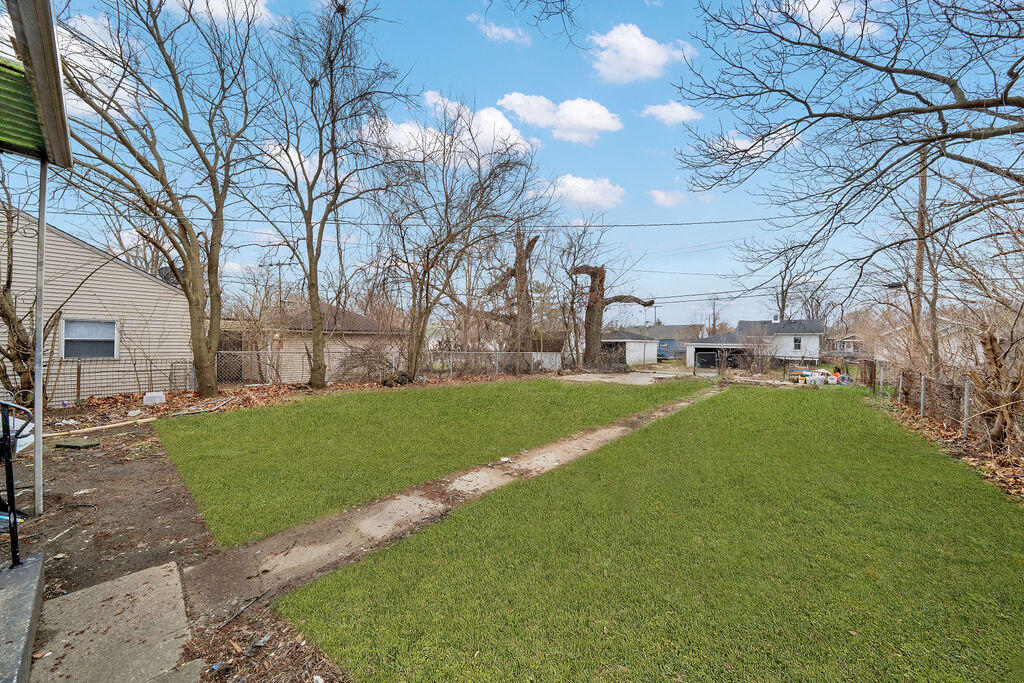 4084 Tyler Street Gary, IN 46408 - Photo 20 of 21 a view of a house with a back yard