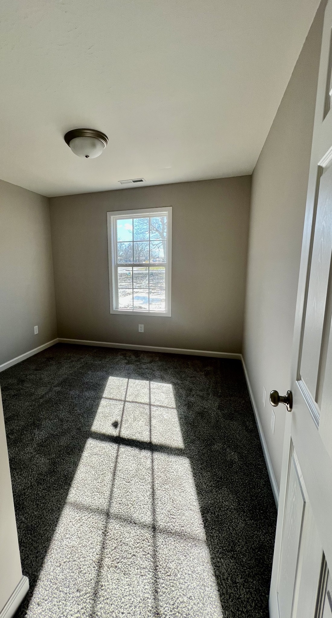 120 Liberty Street Portland, TN 37148 - Photo 10 of 12 an empty room with windows