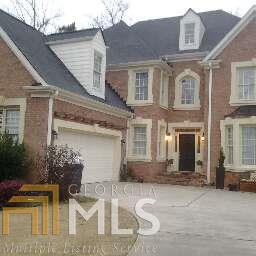 3931 Cherry Ridge Boulevard Decatur, GA 30034 - Photo 1 of 1 a front view of a house with garden
