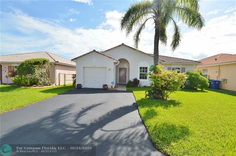 Beautiful and well maintained, this gem of a home is located in a great neighborhood within a gated community.