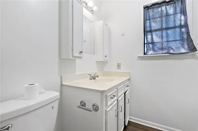 a bathroom with a sink and a vanity