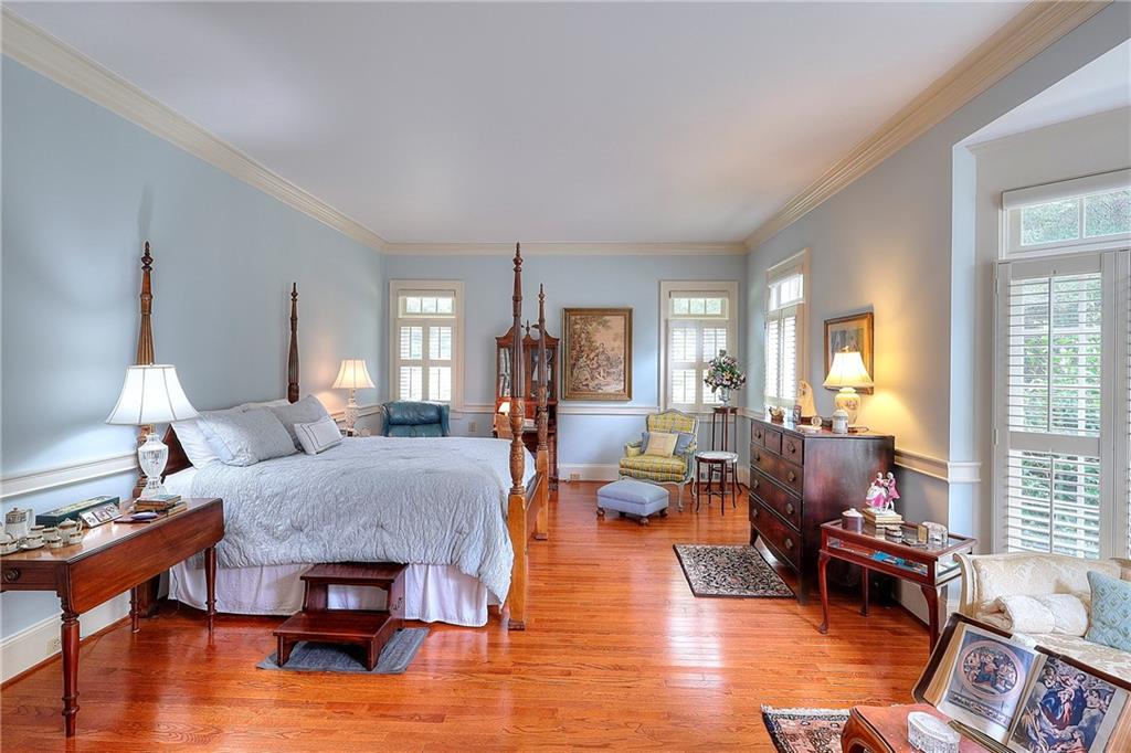 600 River Cove Road Social Circle, GA 30025 - Photo 12 of 45 a living room with furniture and wooden floor