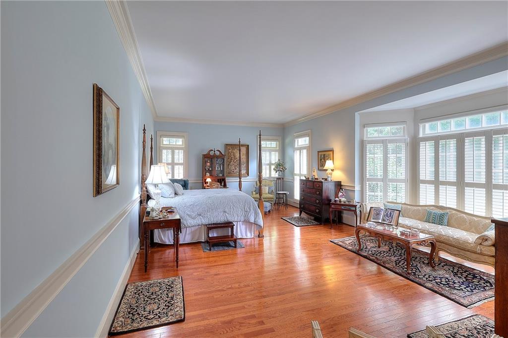 600 River Cove Road Social Circle, GA 30025 - Photo 14 of 45 a living room with furniture and a large window