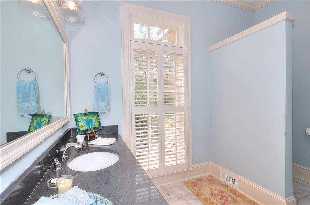 600 River Cove Road Social Circle, GA 30025 - Photo 17 of 45 a room with furniture and a window