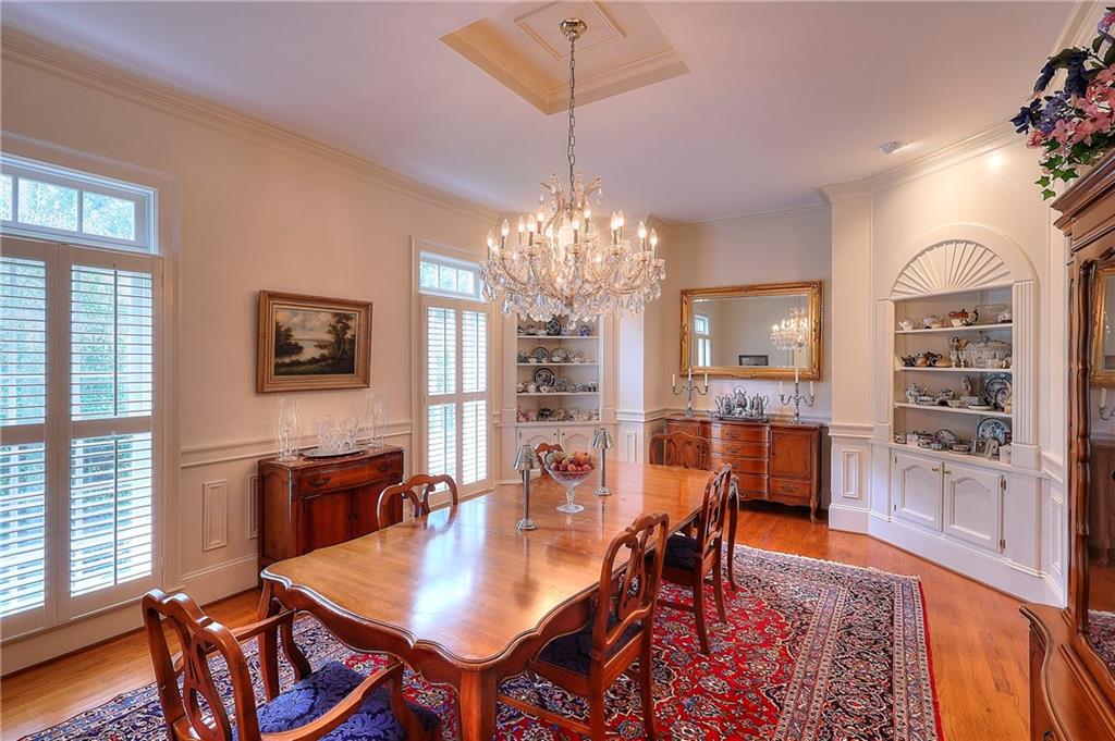600 River Cove Road Social Circle, GA 30025 - Photo 3 of 45 a view of a dining room with furniture window and wooden floor
