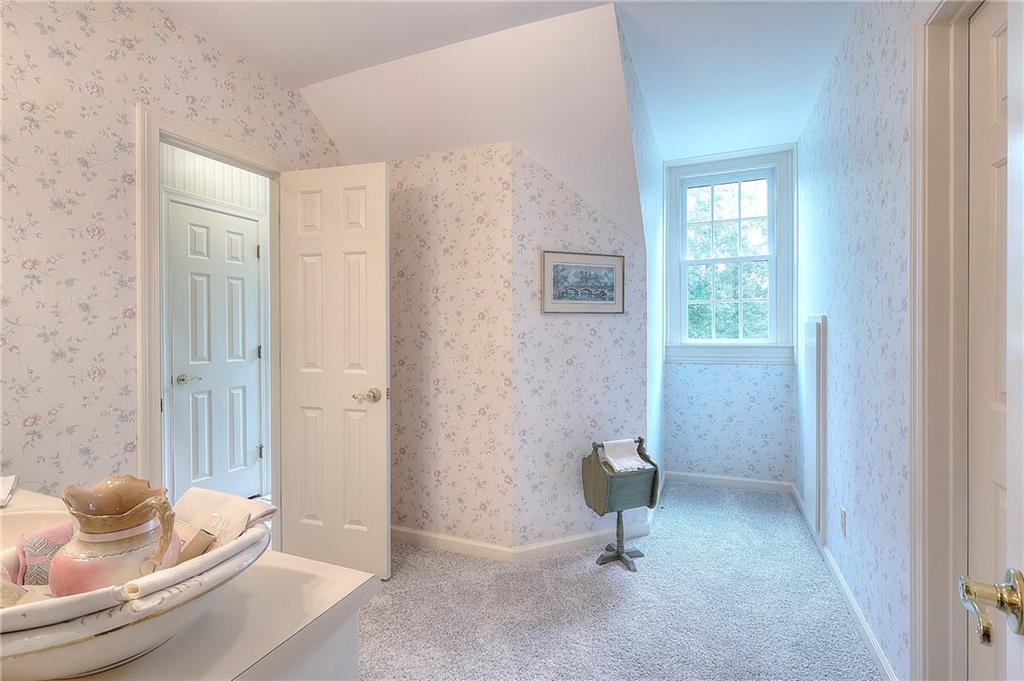 600 River Cove Road Social Circle, GA 30025 - Photo 33 of 45 a view of a livingroom with a couch and a window