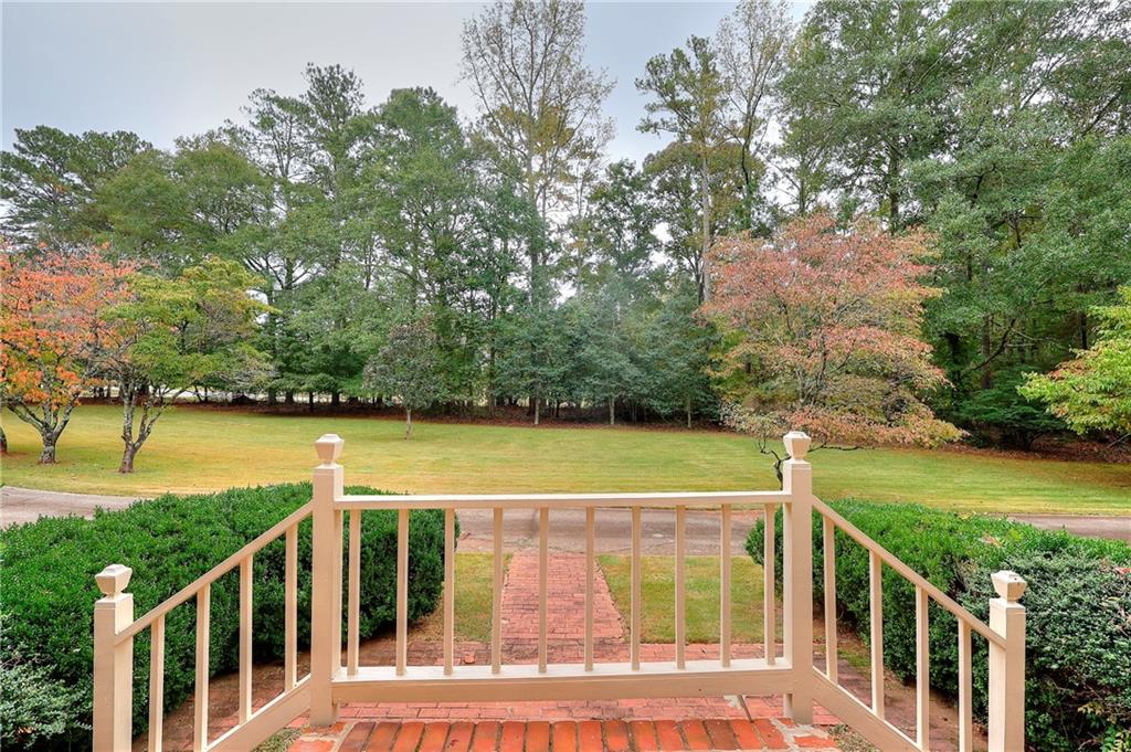 600 River Cove Road Social Circle, GA 30025 - Photo 40 of 45 a view of a yard with an outdoor space