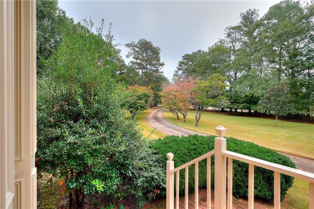 600 River Cove Road Social Circle, GA 30025 - Photo 41 of 45 a view of a wooden deck and lake