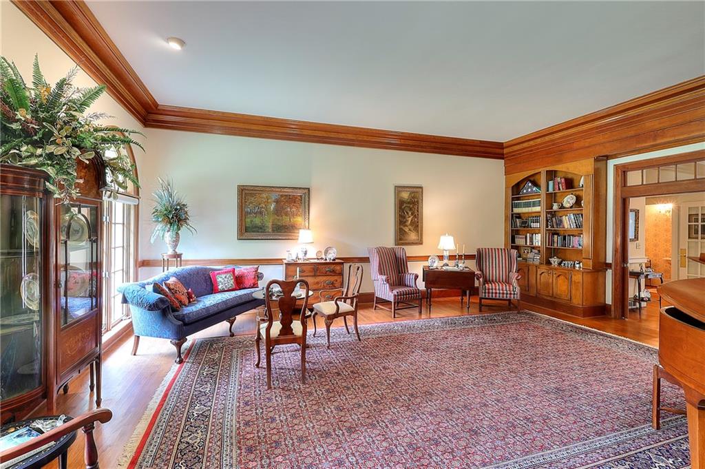 600 River Cove Road Social Circle, GA 30025 - Photo 9 of 45 a living room with furniture a rug and a window