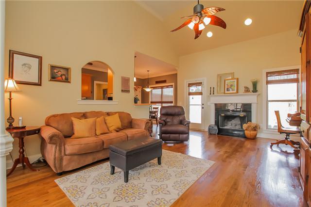 410 Reagan Road Mount Juliet, TN 37122 - Photo 5 of 20 Living room with fireplace. This space is great for entertaining as it is open to the dining room and the kitchen.