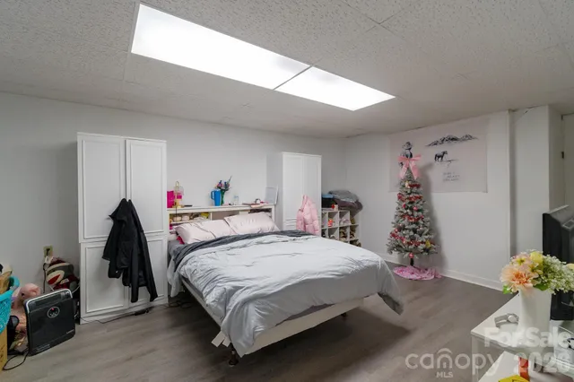 a bed room with a bed and a couch