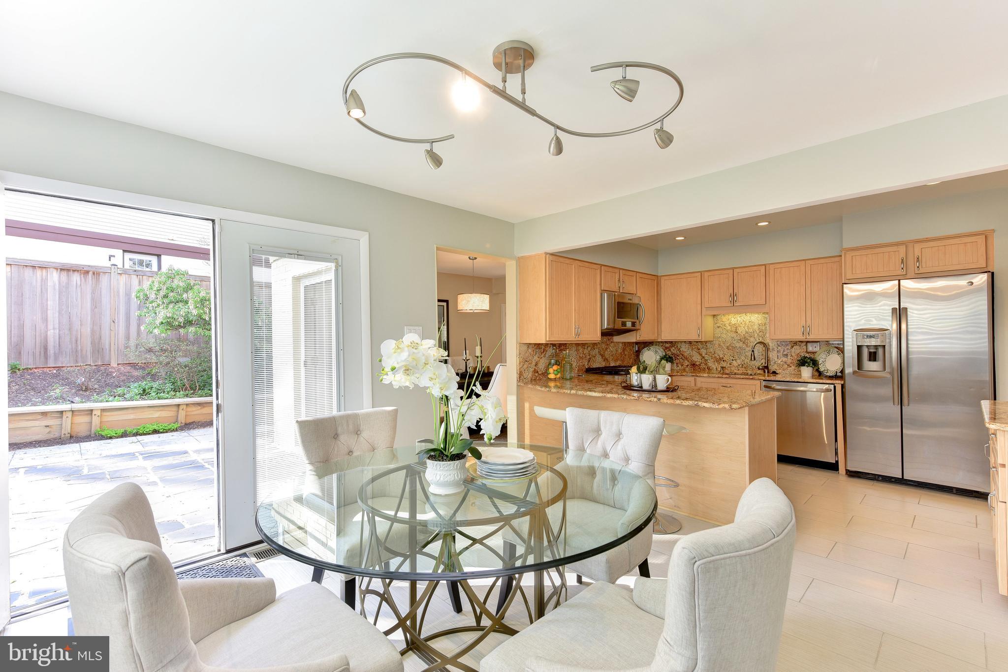 11803 Tree Fern Court Reston, VA 20191 - Photo 12 of 38 Breakfast Room & Adjoining Slate Patio