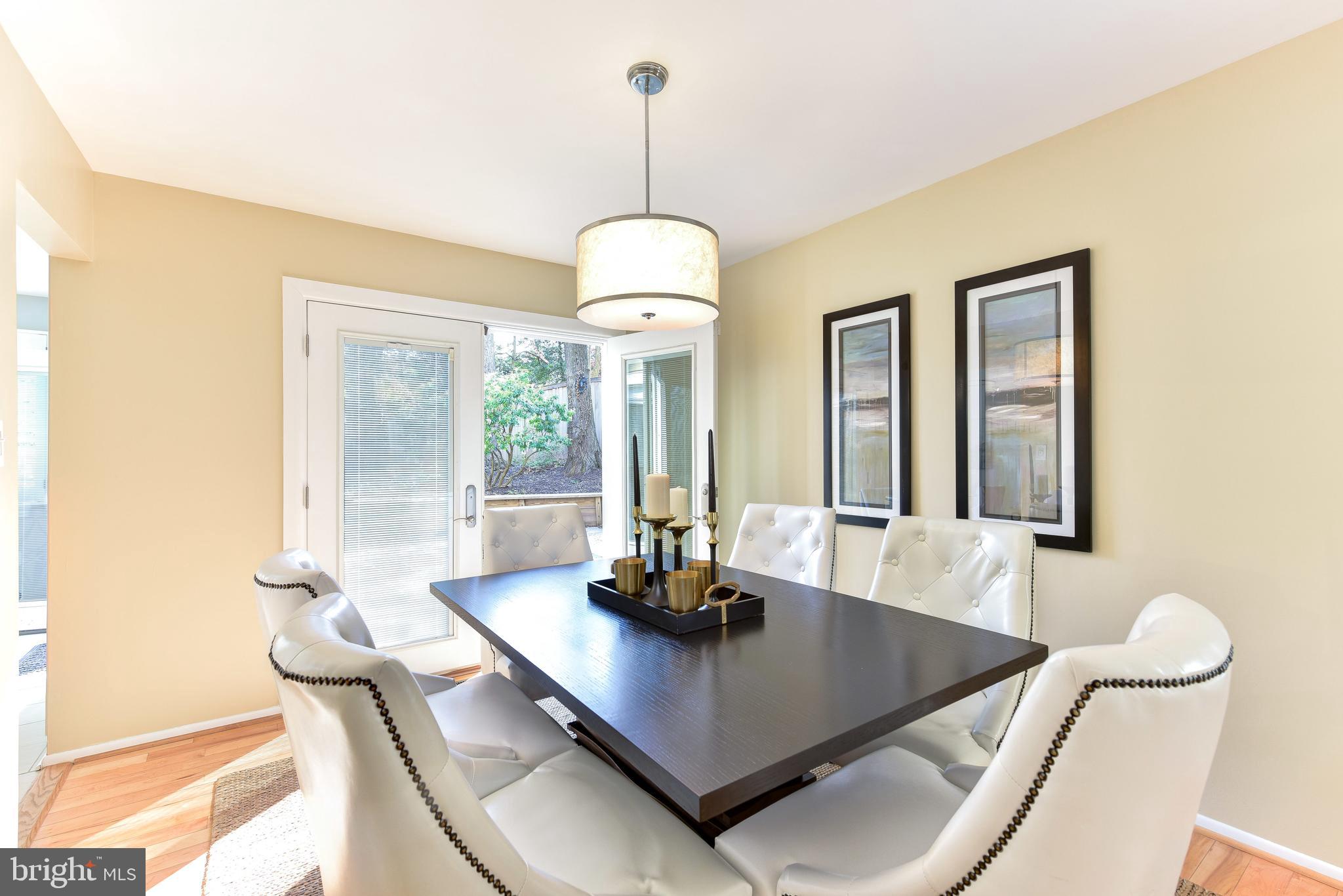 11803 Tree Fern Court Reston, VA 20191 - Photo 6 of 38 Formal DiningFormal Dining Opens to Slate Patio