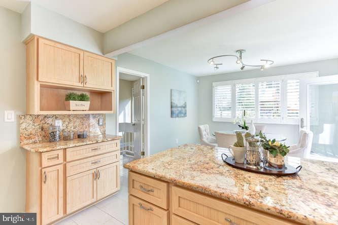 11803 Tree Fern Court Reston, VA 20191 - Photo 10 of 38 Walls of Wood Cabinets and Workstation