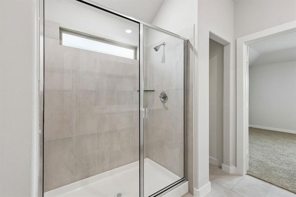 1140 Del Rio Drive Lavon, TX 75166 - Photo 17 of 32 Primary Bathroom in the Oscar home plan by Trophy Signature Homes – REPRESENTATIVE PHOTO