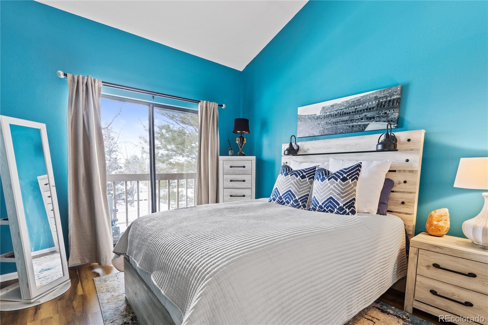 5092 Buckingham Road Boulder, CO 80301 - Photo 14 of 25 a bedroom with a bed and a large window