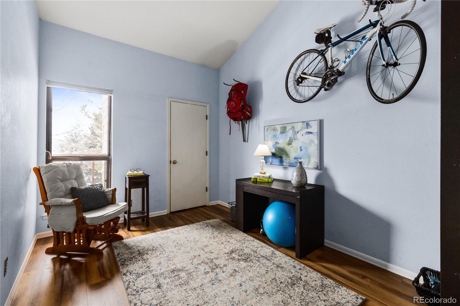 5092 Buckingham Road Boulder, CO 80301 - Photo 19 of 25 a view of a workspace with furniture and a window