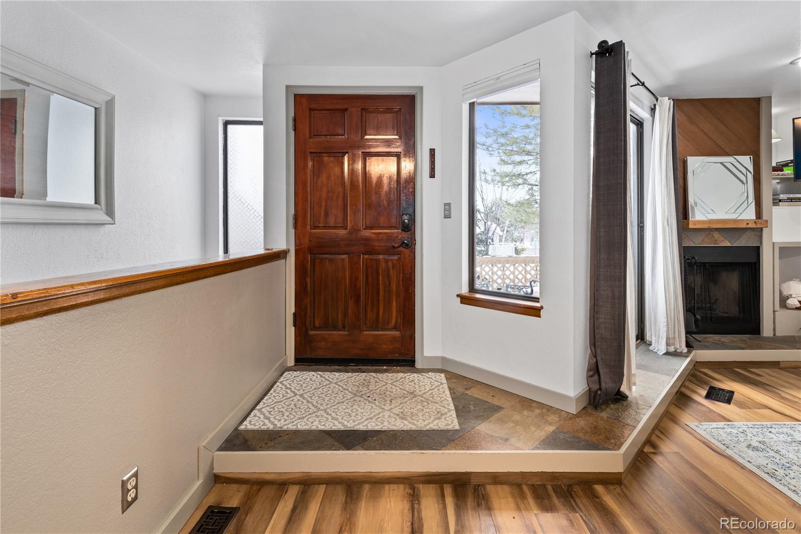 5092 Buckingham Road Boulder, CO 80301 - Photo 2 of 25 a view of an entryway with furniture