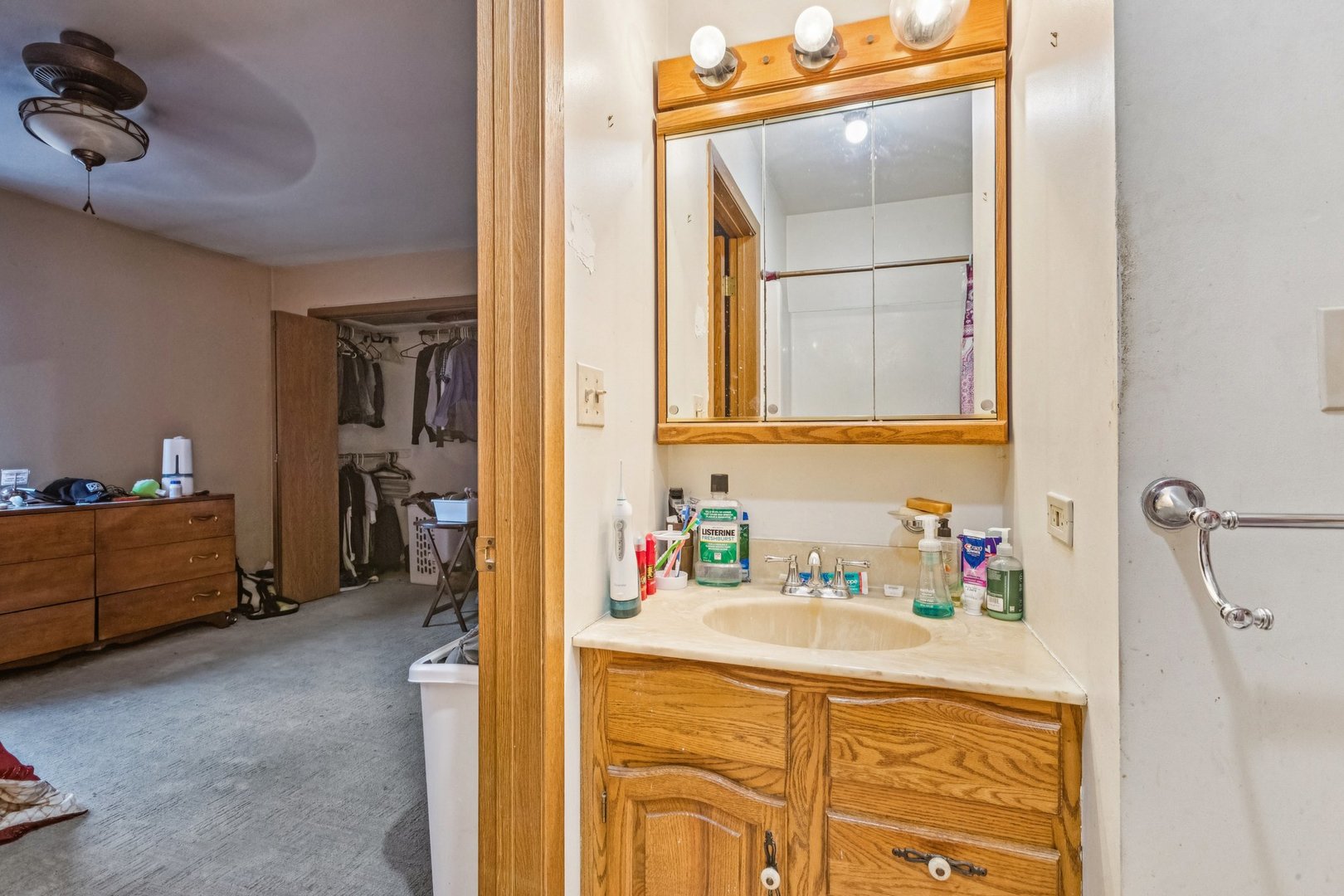 25283 Timber Lane Lake Villa, IL 60046 - Photo 21 of 49 a bathroom with a sink and a mirror