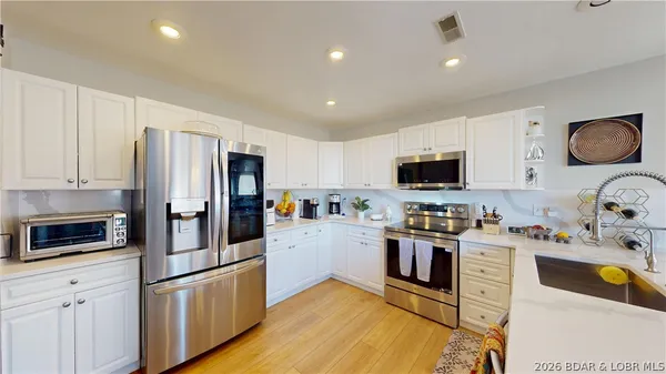 $1,295,000 | 275 Cimmaron Bay Circle, Sunrise Beach, MO 65079