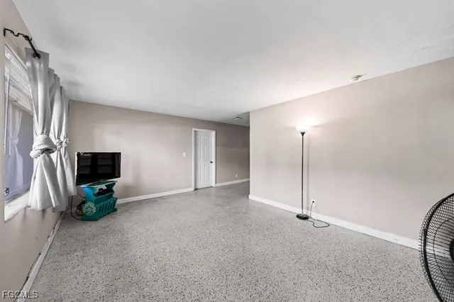 a view of a livingroom with a flat screen tv