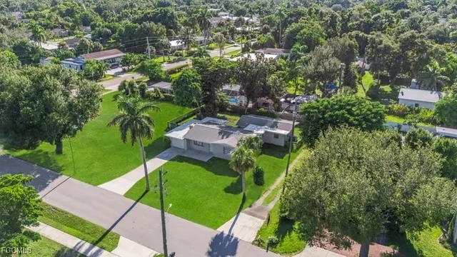 an aerial view of a house with a garden