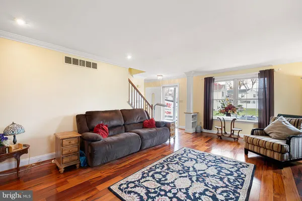 a living room with furniture and a couch