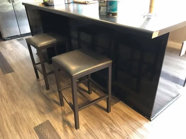 a view of balcony with furniture