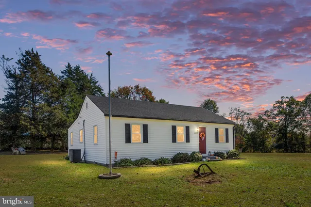 a house view with a garden space