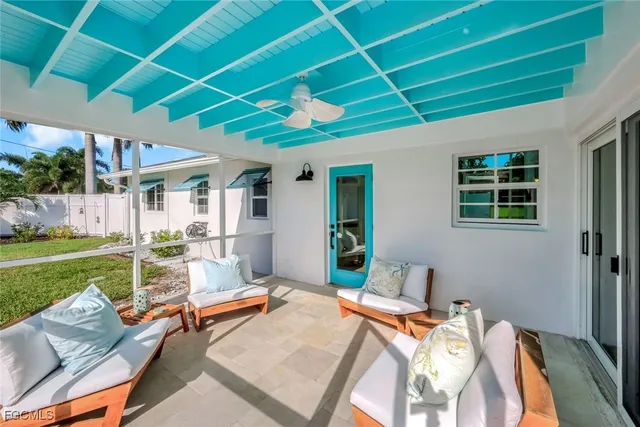 a view of a swimming pool with a patio